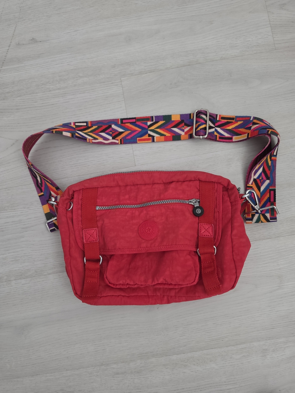 Kipling Red Crossbody Bag with Multicolor Geometric Strap